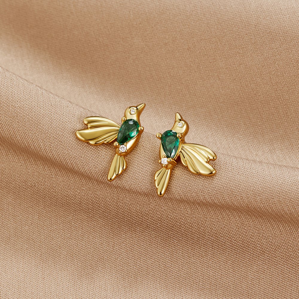 Hummingbird Stud Earrings, pair of gold hummingbird earrings with green pear-cut stones on satin