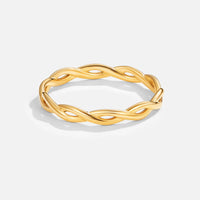 Infinity 18K Gold Twist Ring, standing alone on a plain white background, braided gold band