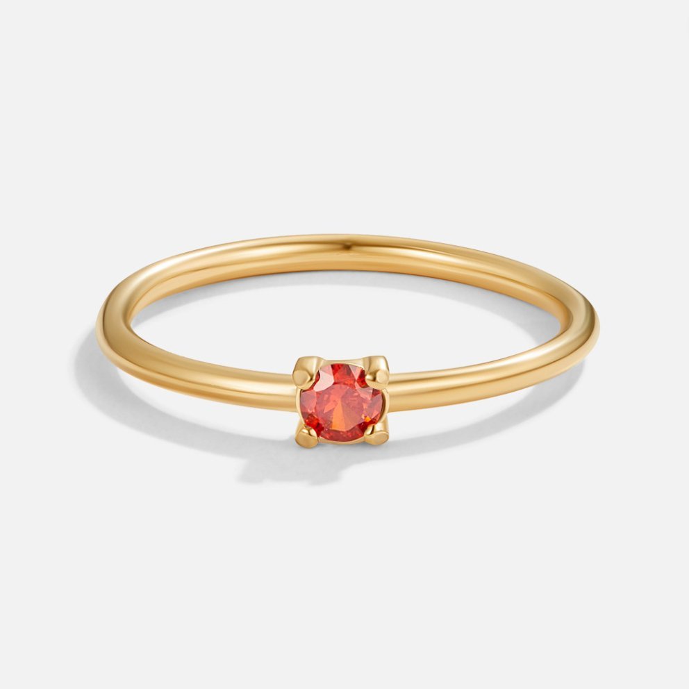 July Birthstone 18K Gold Ring, standalone on white, thin gold band with small red stone