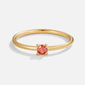 July Birthstone 18K Gold Ring, standalone on white, thin gold band with small red stone