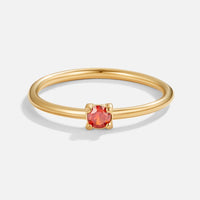 July Birthstone 18K Gold Ring, standalone on white, thin gold band with small red stone