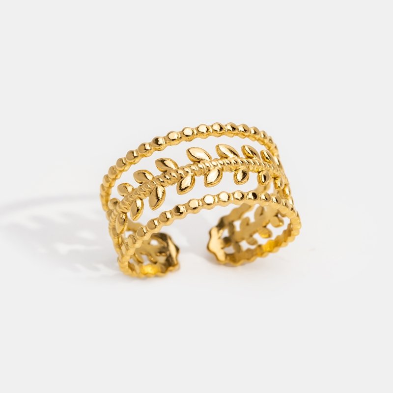 Marissa Layered Gold Leaf Ring, standing alone on a white background, angled view of an open band
