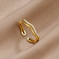 Layered Juni Gold & Crystal Ring, gold open ring with wavy band and crystal row on satin