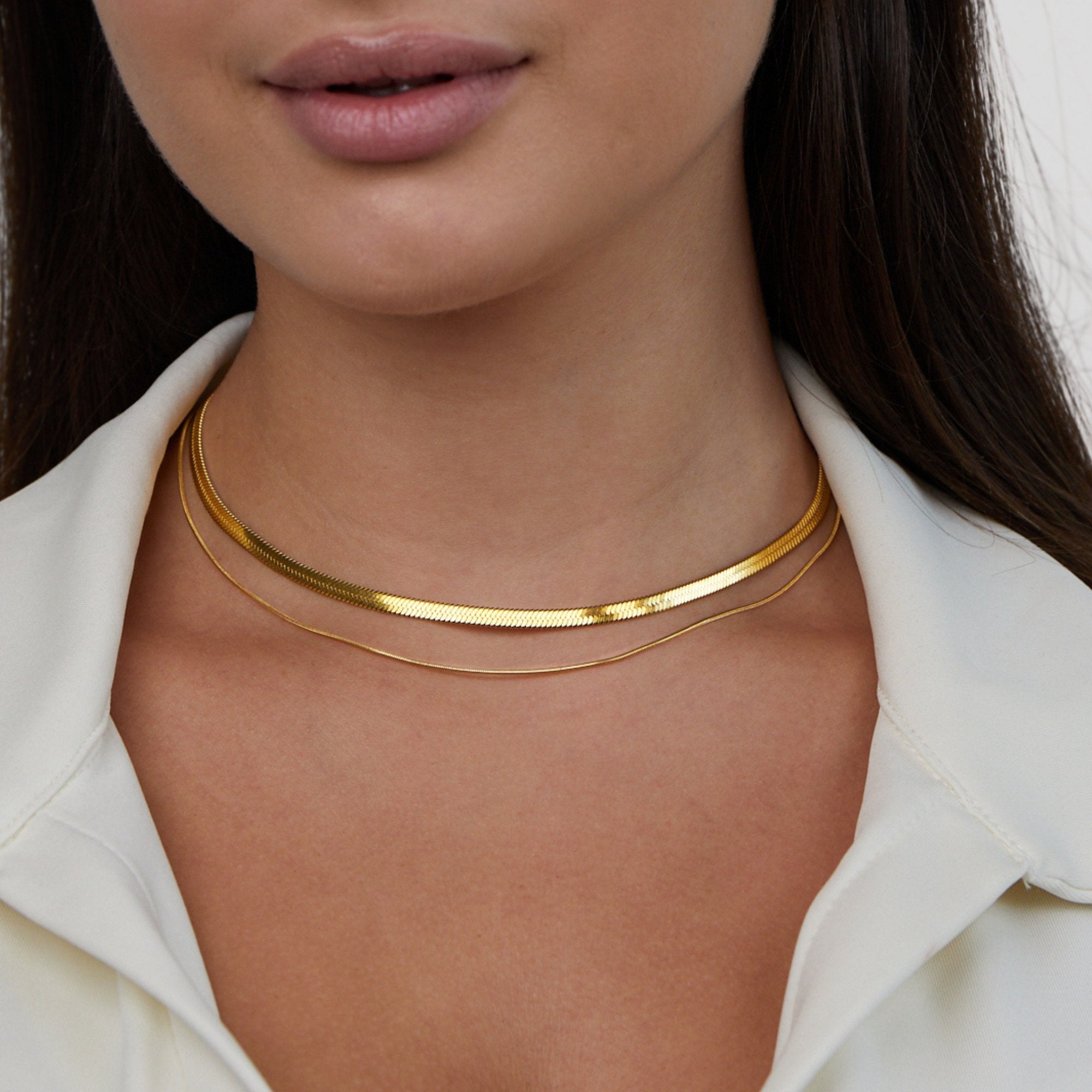 Layla 18K Gold Layered Necklace, worn at the neck over a cream collared shirt, two gold chains