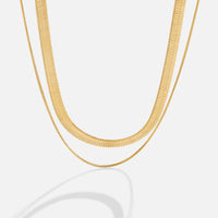 Layla 18K Gold Layered Necklace, two gold chains layered on a white background, one wide and