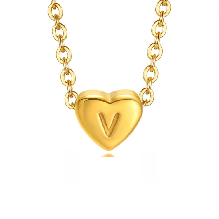 Letter Heart Bracelet, gold heart pendant engraved with the letter V on a gold chain, against white