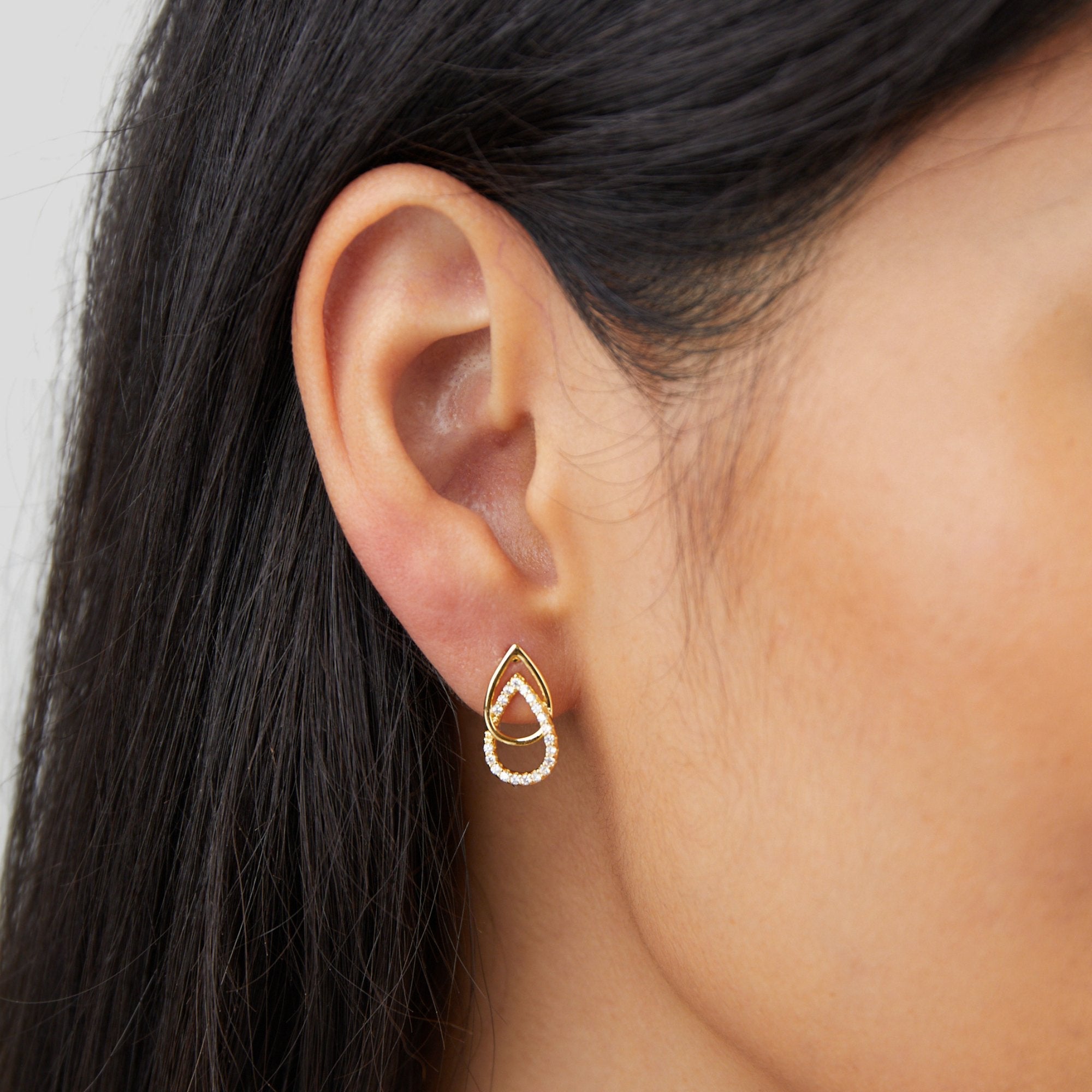 Mara Teardrop Link Earrings, worn on an ear, gold teardrop with small white stones