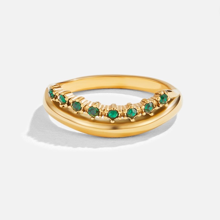 Marissa Emerald Green Layered Ring, gold ring on white background, curved row of green stones