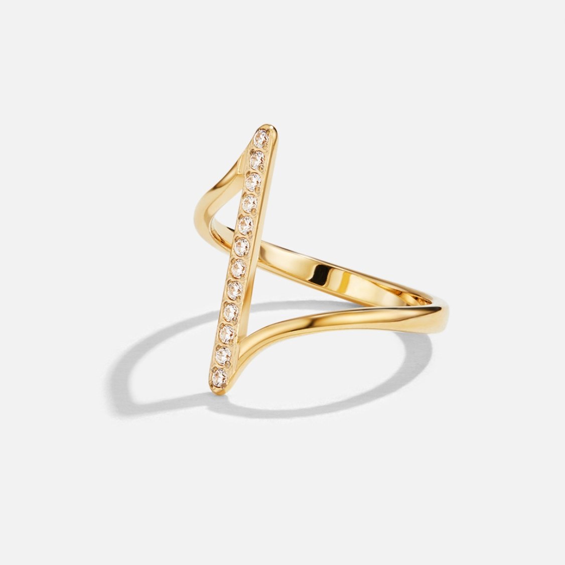 Mila Twisted Gold Ring, gold ring on plain white background, pavé stones along one bar
