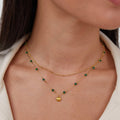 Ocean Lover Shell & Bead Necklace Set, worn layered on a neck, with a gold shell pendant and