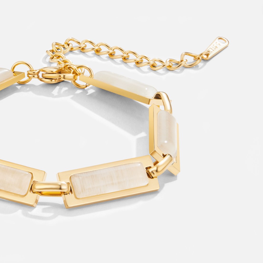 Opal Gold Baguette Bracelet, close-up of gold bracelet with cream stone links and extender chain