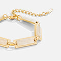 Opal Gold Baguette Bracelet, close-up of gold bracelet with cream stone links and extender chain