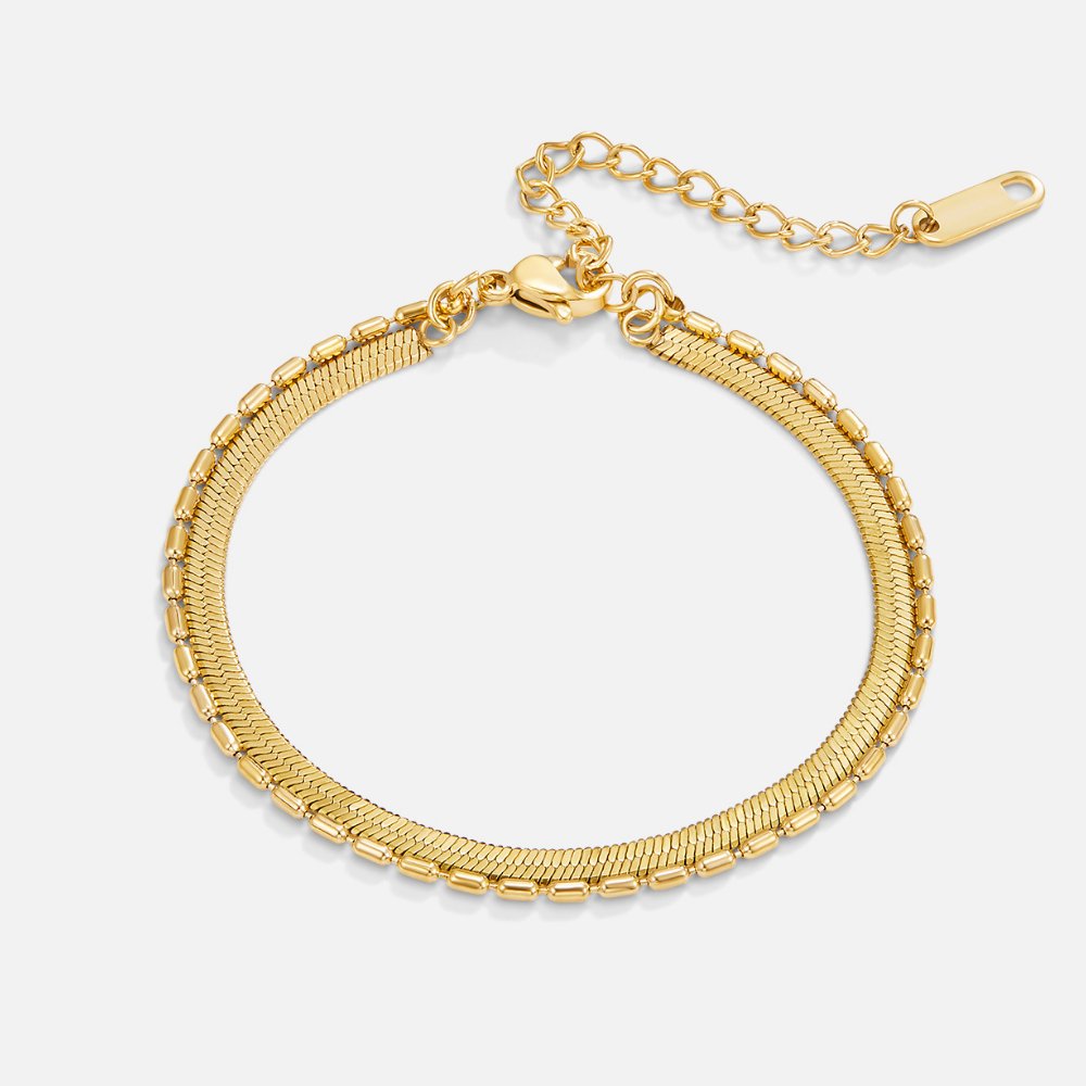 Selene Snake & Bead Chain Bracelet, flat lay of gold bracelet with extender chain and lobster