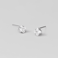 Silver Crystal Clover Stud Earrings, pair of clear crystal clover studs on a plain grey background