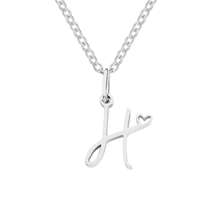 Silver Letter Heart Necklace, silver script letter H pendant on a chain, white background