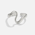 Silver Wave Ring, open wavy band on a plain white background, polished silver finish