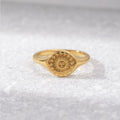 Summer Solstice Gold Ring, gold signet ring on pale stone, engraved sun with face