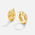 Talia Gold Hoop Earrings, pair of gold hoop earrings on a plain white background