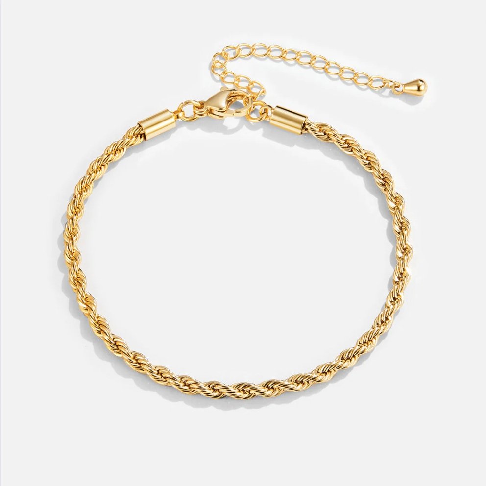 Twisted 18K Gold Bracelet, laid flat in a circle with lobster clasp and extender chain