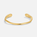 Veena Gold Bangle, polished gold cuff on a plain white background, open at the top